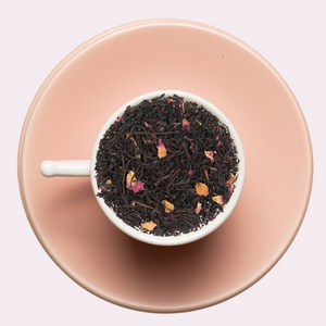 Black tea with rose petals in teacup – luxury floral blend for focus and calm